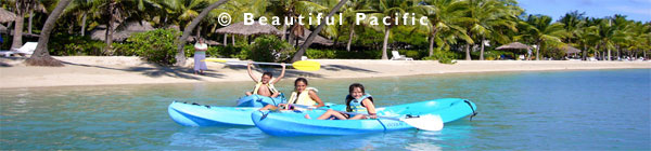 picture of kids kayaking on a family holiday in the south pacific islands